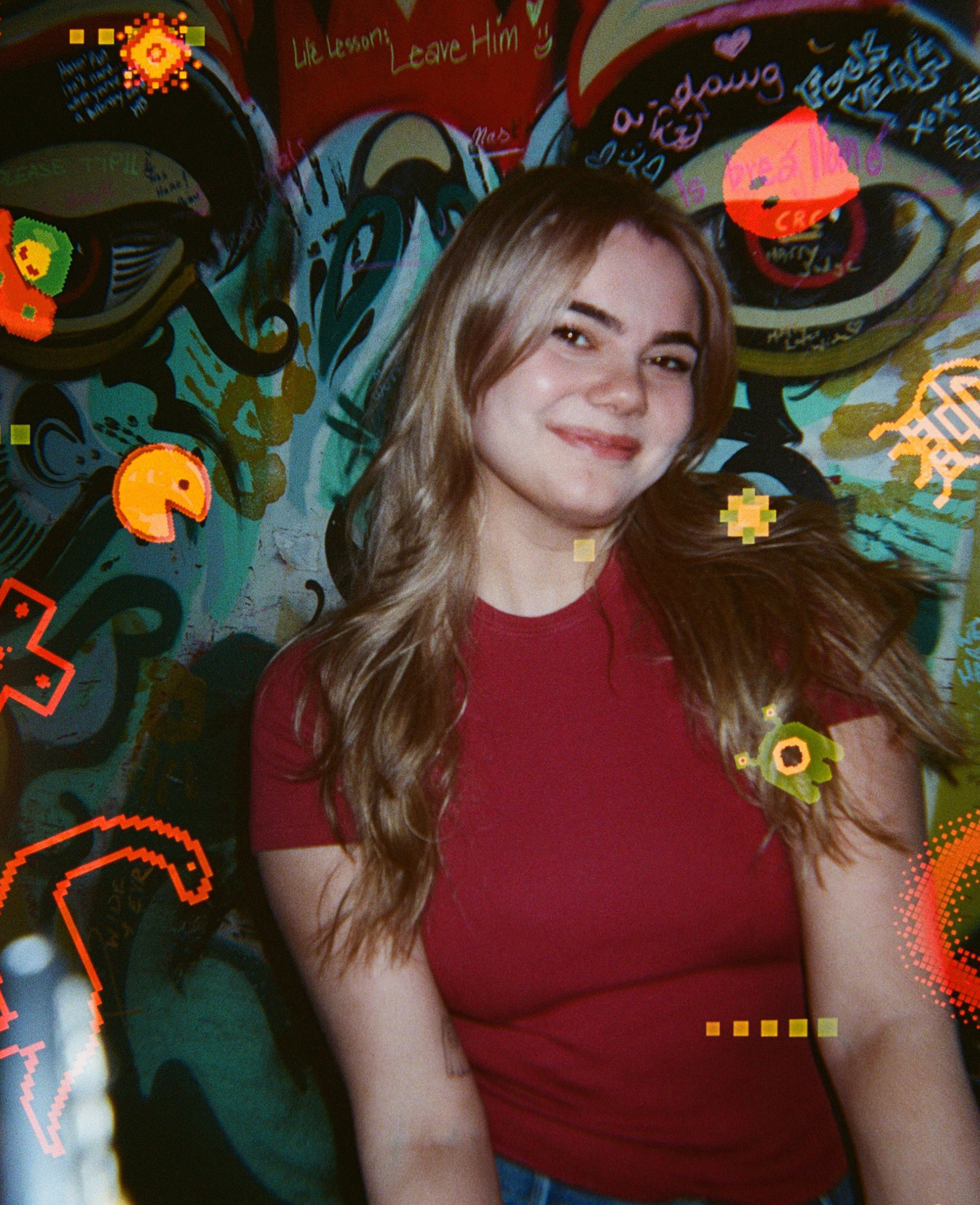 Maja Tomic, portrait against a graffiti wall with Y2K-style pixel art overlays